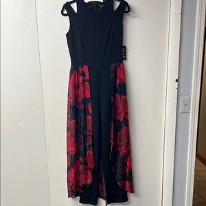 Black and red floral dressy pantsuit that looks like a formal dress.